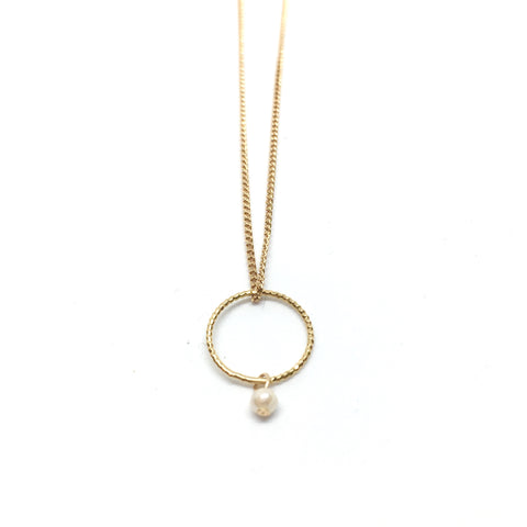 Circle and pearl pendant