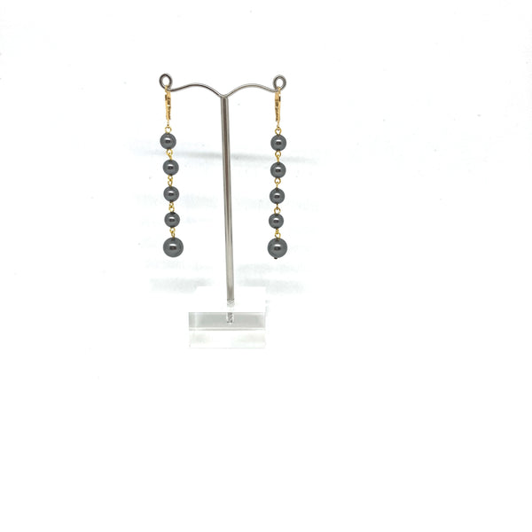 Long pearl earrings