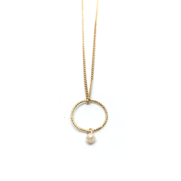Circle and pearl pendant